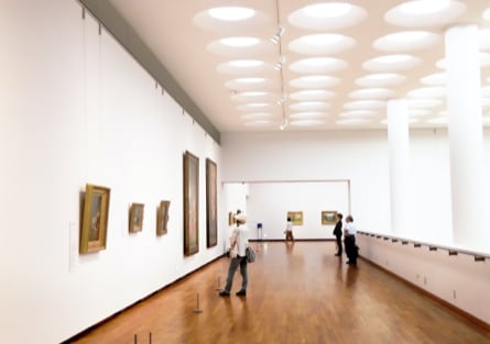 Picture of people wallking in a gallery